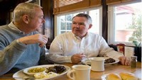 Senior Men Dining in Public